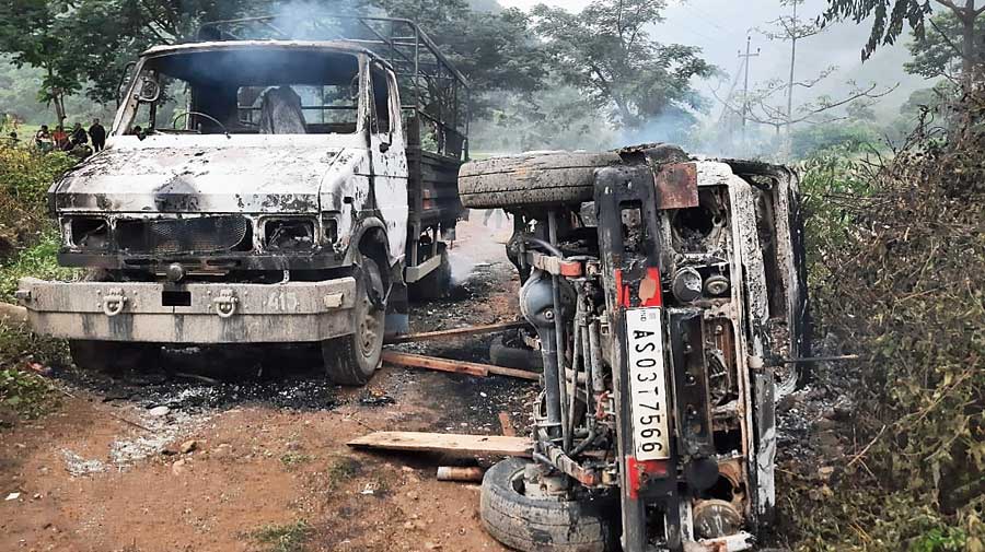 The two vehicles burnt down in protest against the killing of the youth by Assam Rifles personnel 