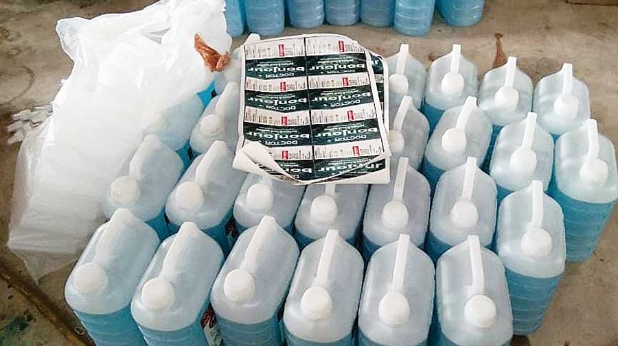 Some of the seized  bottles of fake sanitiser