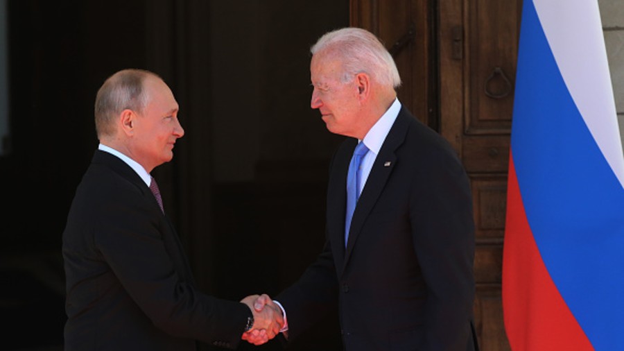  Russian President Vladimir Putin (L) greets President of USA Joe Biden (R) during the US - Russia Summit 2021 at the La Grange Villa near the Geneva Lake