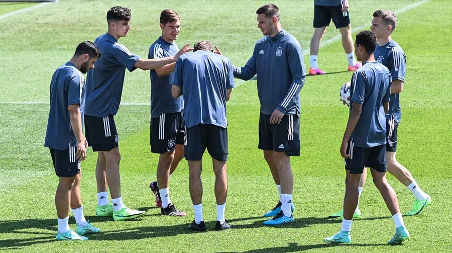 Portugal's Cristiano Ronaldo and Pepe shares a light moment ahead of their game against Germany, on Friday.