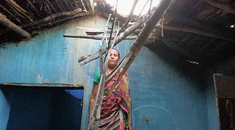 Janani Bera, a widow, at Sonua in Chakradharpur, West Singhbhum, whose house has been damaged by the cylone