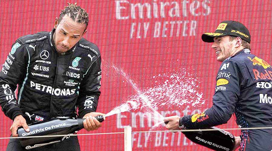 Lewis Hamilton (left) of Mercedes with Red Bull’s Max Verstappen on Sunday.