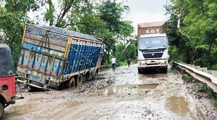 A potholed stretch of NH14 at Nalhati in Birbhum.