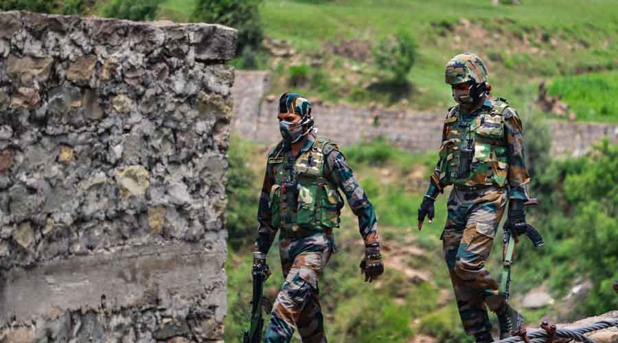 Indian Army jawans patrol near Line of Control 