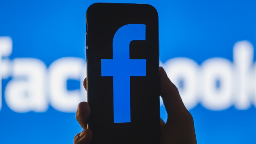 Facebook parent posts first-ever revenue drop