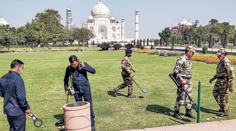Security personnel scan the premises of the Taj Mahal on Thursday
