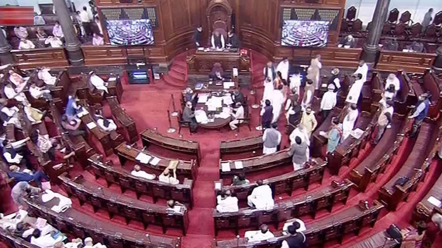 Opposition leaders protest in Rajya Sabha during the Budget Session of Parliament in New Delhi on Tuesday.