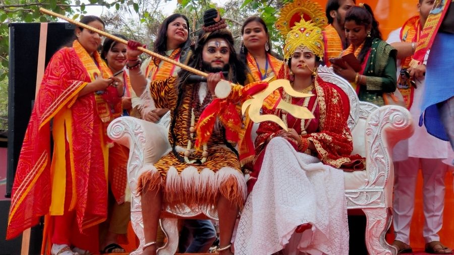 Artists dress up as  Lord Shiva and Parvati during the Mahashivratri Festival at Pahari Mandir on Thursday.