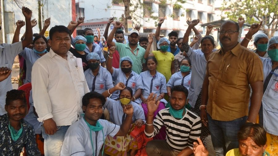 Hospital cleaners during their agitation at the MGM College and Hospital in Jamshedpur on Thursday.