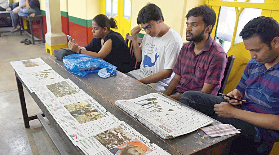 Calendars with pictures of farmers’ movements being sold at the venue