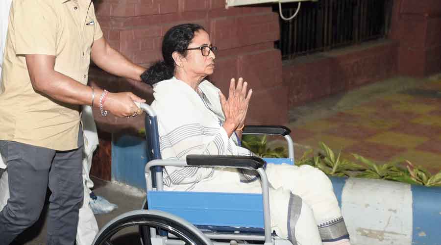 Mamata Banerjee being wheeled out of SSKM Hospital on Friday