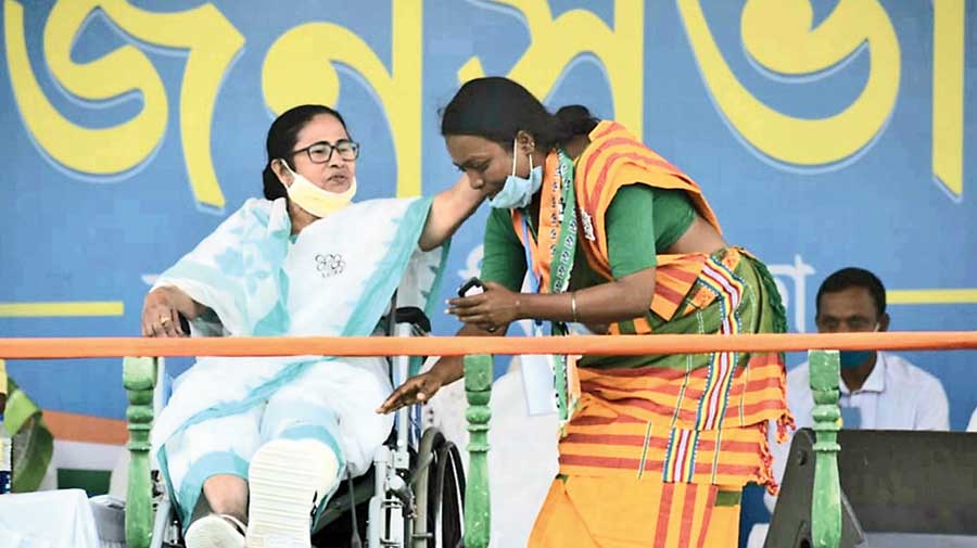 Mamata with Trinamul\xe2\x80\x99s Jhargram candidate Birbaha Hansda in Lalgarh on Wednesday. 