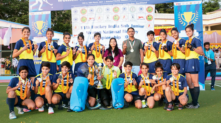 The Haryana team with their medals and the winner’s trophy on Thursday.