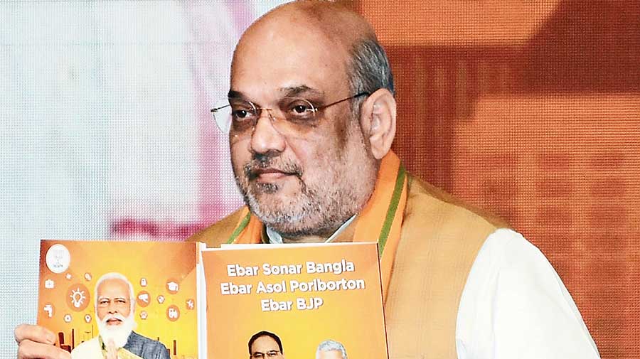 CAA + intruder net + Aarti = Sonar Bangla  BJP releases West Bengal election manifesto