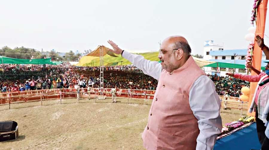 Shah waves at the crowd in Gosaba on Tuesday