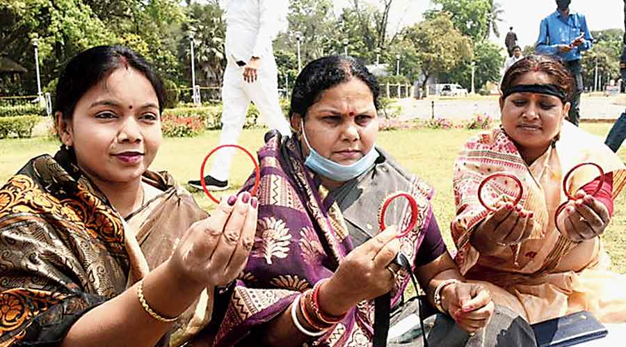 Opposition women legislators offer bangles to Bihar chief minister Nitish Kumar on Wednesday in protest against Tuesday’s violence