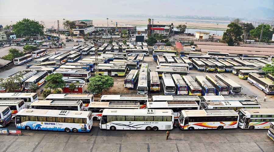 Buses stand parked at a terminal  in Vijayawada, Andhra Pradesh