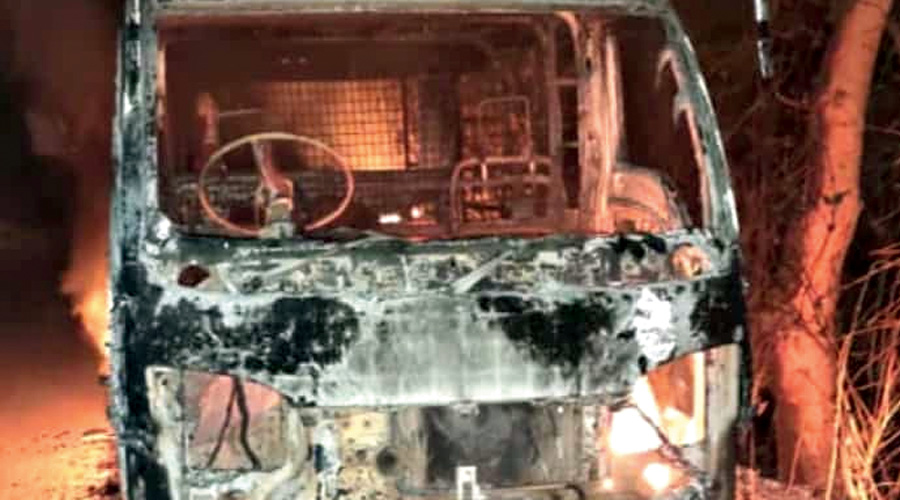 The car set ablaze at Bandwan in Purulia on Friday.