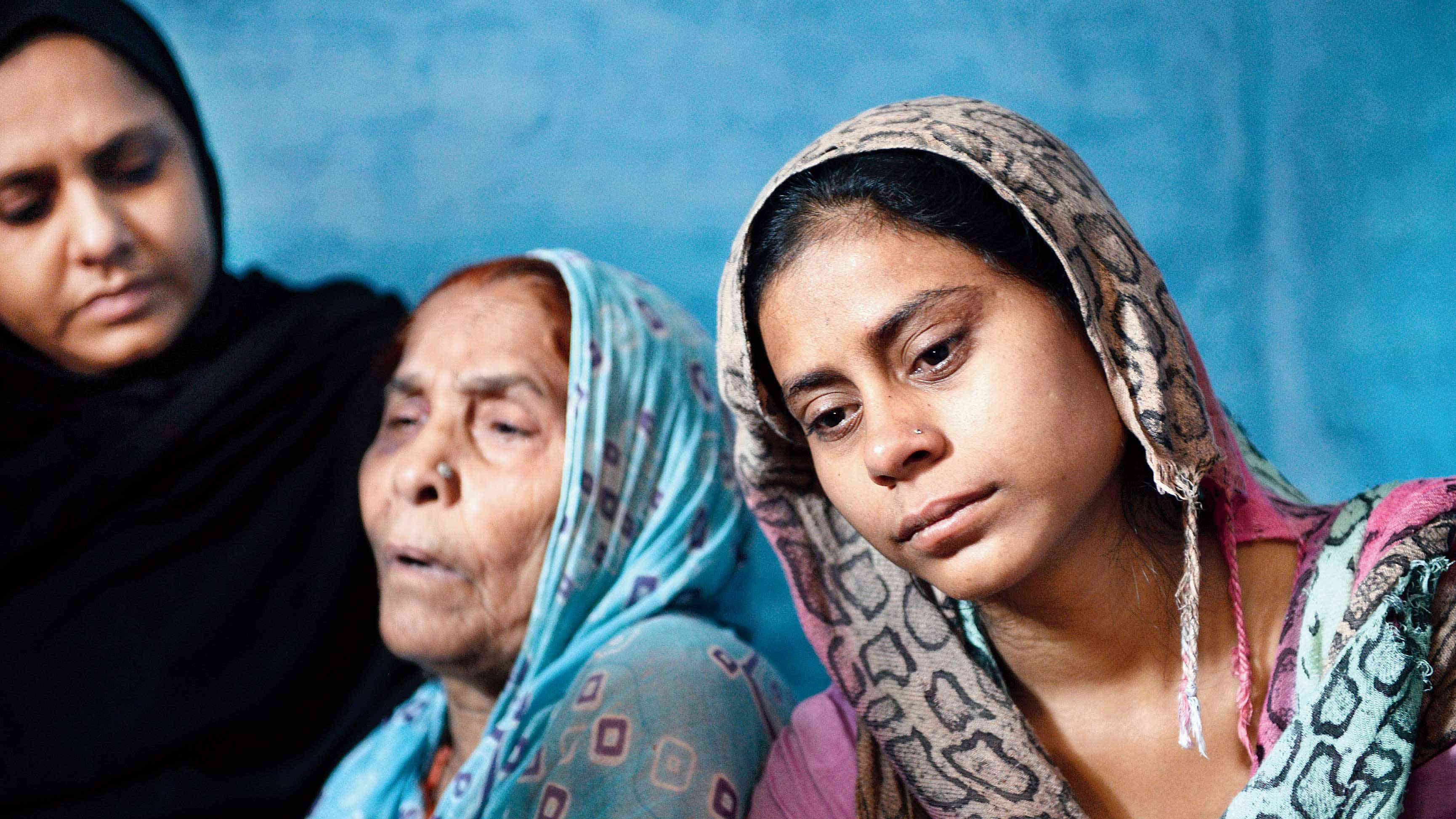 Akhlaque’s mother Asgari Begum (centre) and his daughter Shaista (right) at their Bisara home in Dadri in September 2015. Asgari Begum was also beaten up by the raiding mob when she tried to save her son.