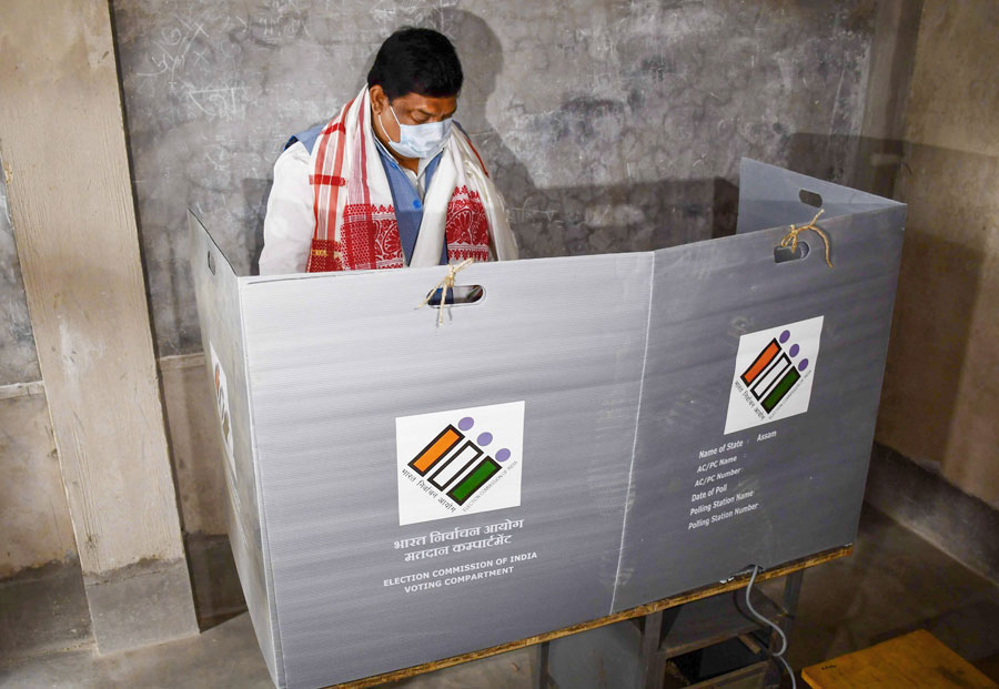 Congress leader Rokibul Hussain casts his vote during in the first phase of polling for Assam Assembly elections, in Nagaon district on Saturday.