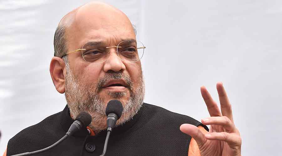 Union Home Minister Amit Shah addressing a press conference at his residence, in New Delhi on Sunday, March 28, 2021.