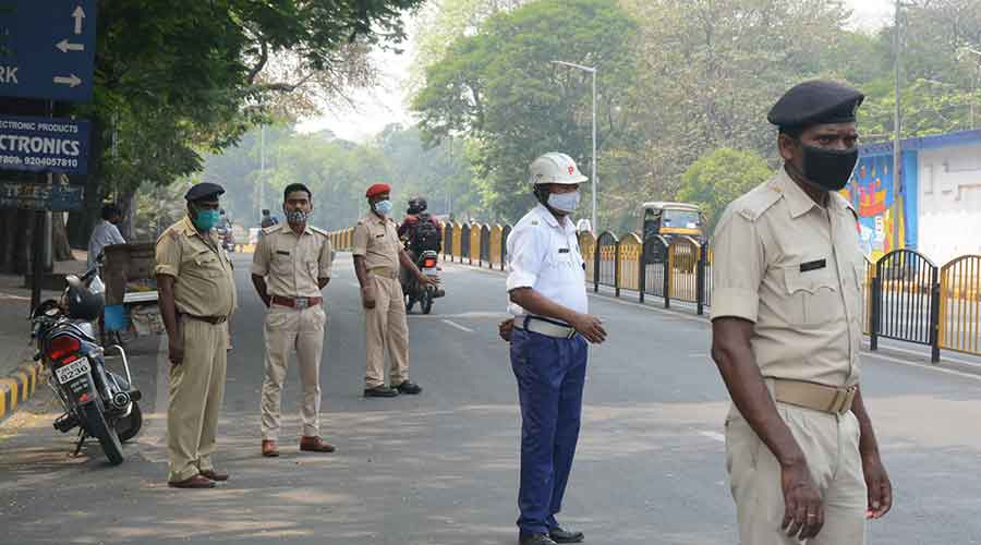 Police on vigil at the Straight Mile Road in Bistupur on Monday. 