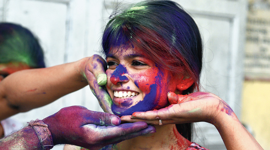 Holi being celebrated in the Rabindra Sarani area.