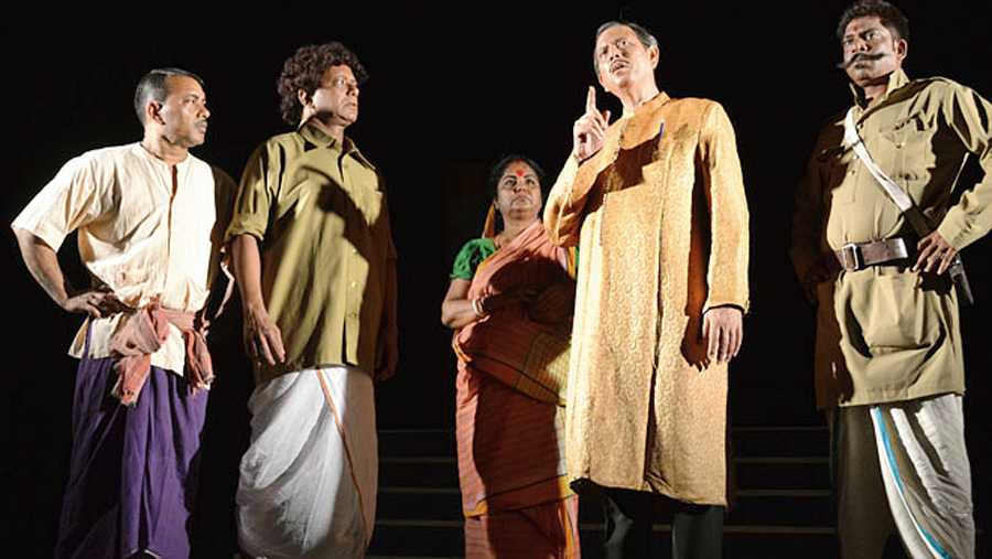 A moment from the play, Ebar Rajar Pala.