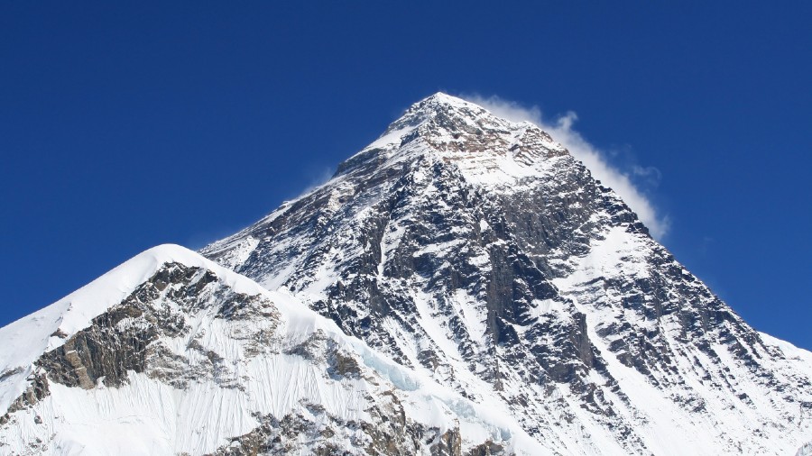 Chinese national scales Mount Everest from Nepal side