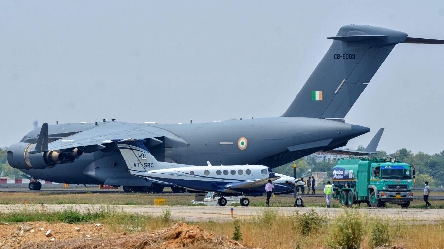 An IAF aircraft carrying oxygen cylinder arrives at Birsa Munda Airport in Ranchi on Monday.