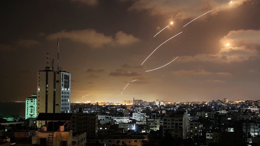 Rockets launched from the Gaza Strip, controlled by the Palestinian Hamas movement, are intercepted by Israel's Iron Dome aerial defence system on May 12, 2021