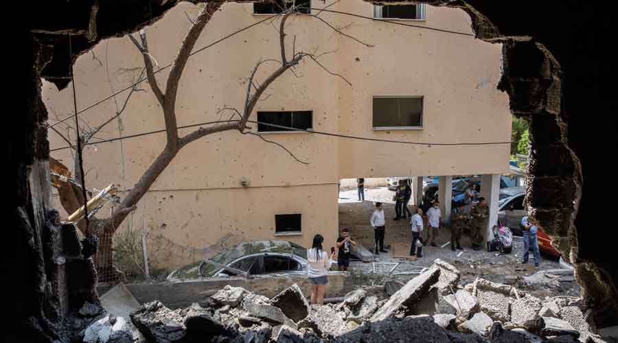 A building hit by a rocket fired from the Gaza Strip in Petah Tikva