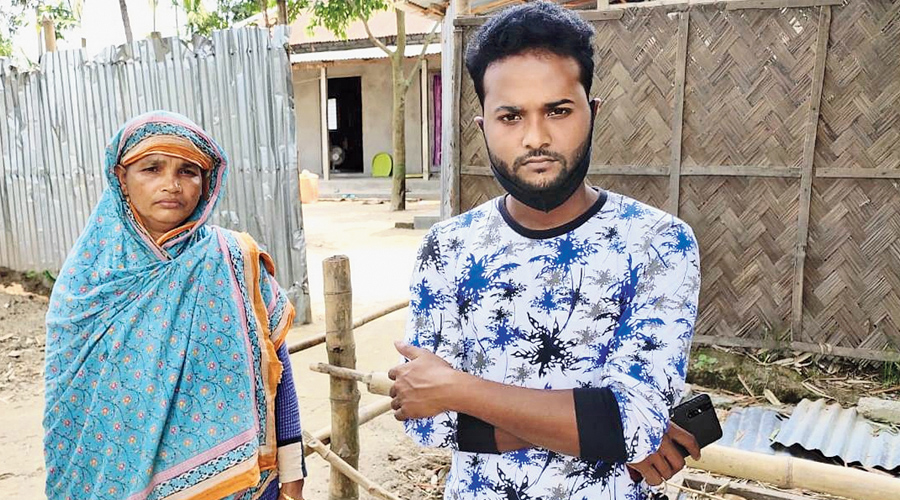 Pinku Rehman and Mamata Bibi, the brother and mother of Maniruzzaman Mian (one of the four youths who had fallen to CISF bullets), at Jorpatki village on Monday. 