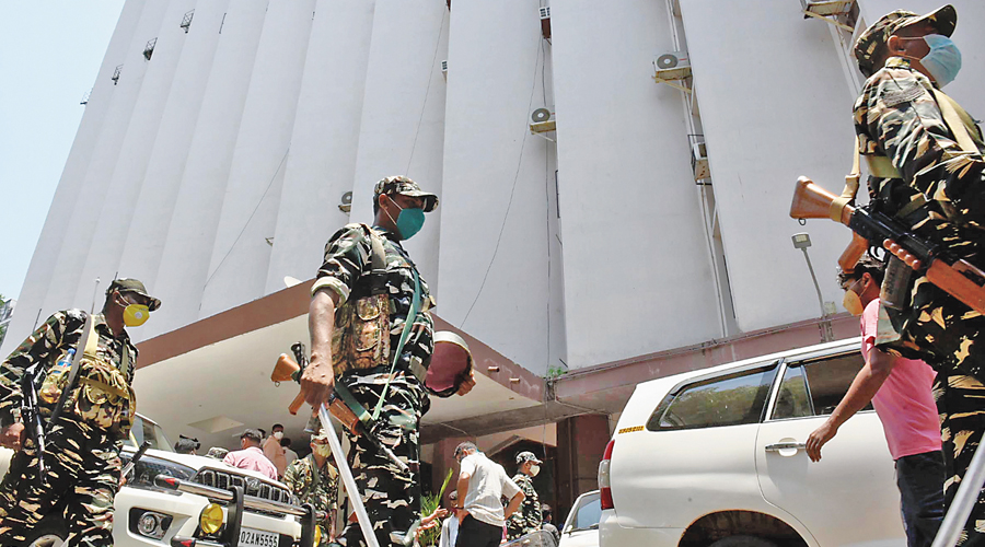 Security personnel outside the CBI office in Calcutta on Monday. 