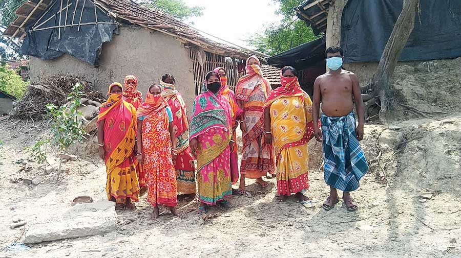 Ram Bag (right) with his family members and neighbours at Mohanpur village, North 24-Parganas. 