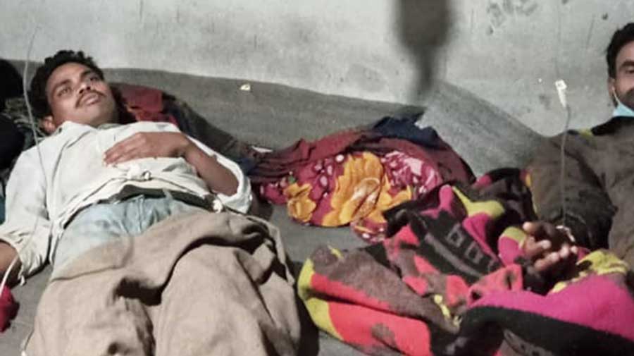 Some of the sick workers receive saline infusion