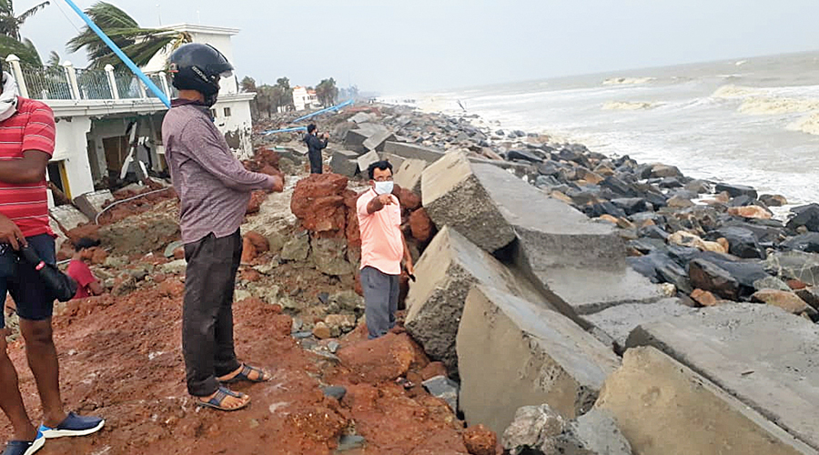 14 villages flooded as guard wall falls: A 2.6km stretch of an under construction concrete guard wall collapsed