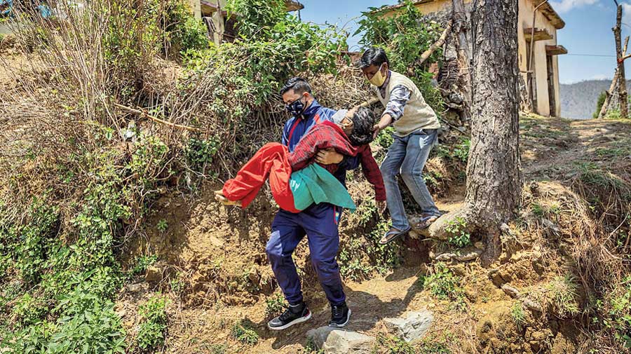 The journey to the dispensary on the tough terrain before they found a creaky taxi.