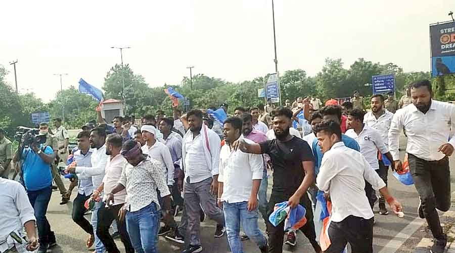 NSUI members protest against Union minister of state for home Ajay Mishra Teni  near the airport in Bhubaneswar on Sunday. 