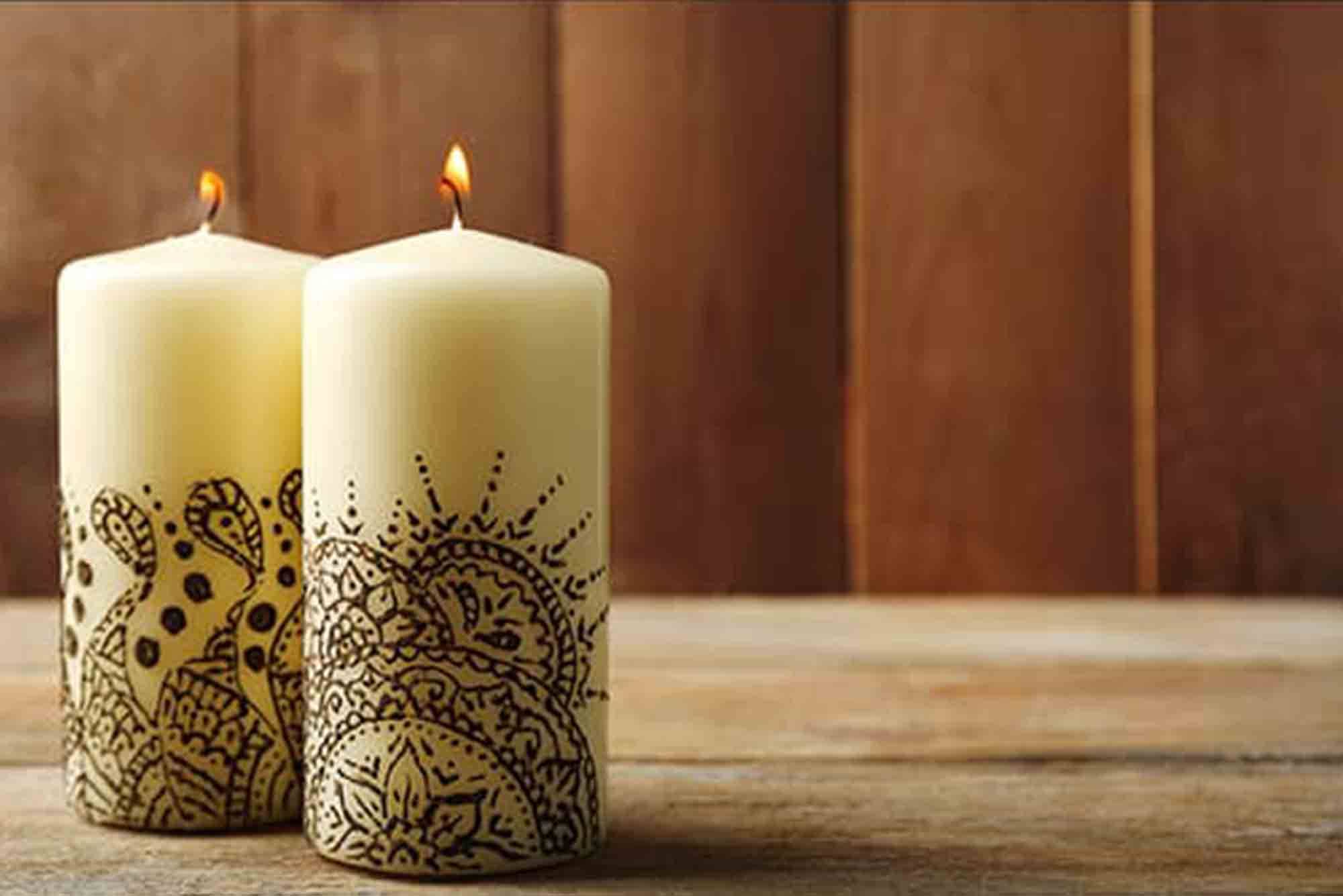 Henna looks beautiful on white candles.