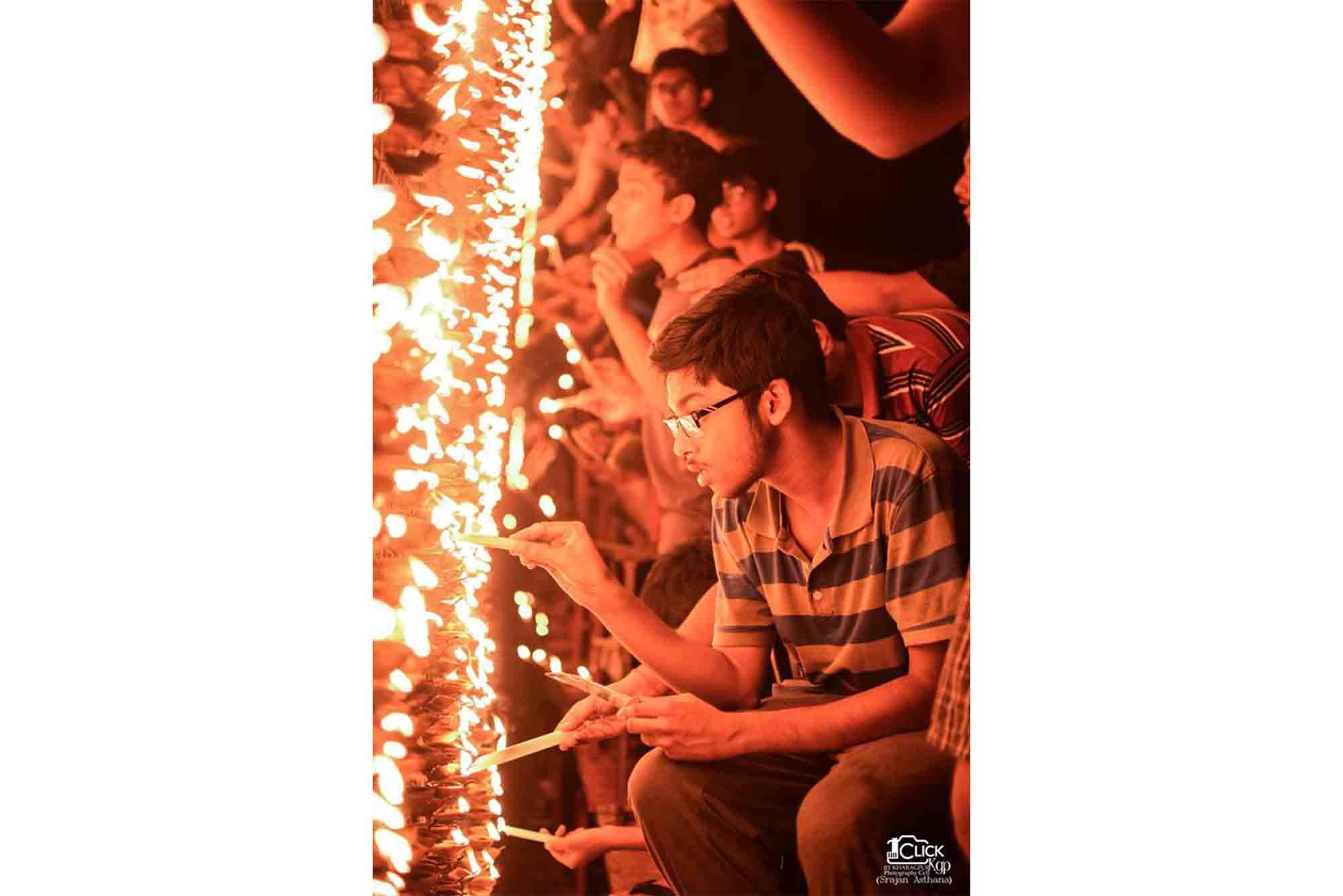 Students light up an installation in 2019.