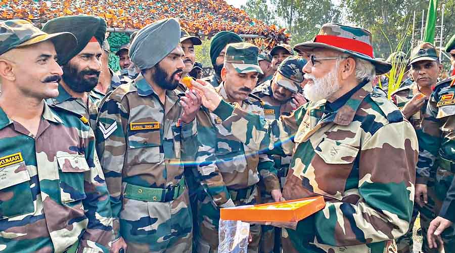 Modi interacts with soldiers at Nowshera on Diwali.