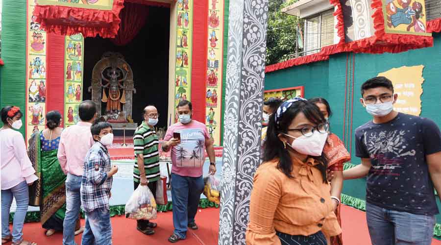 Visitors to a Kali Puja pandal in Kalighat in south Kolkata