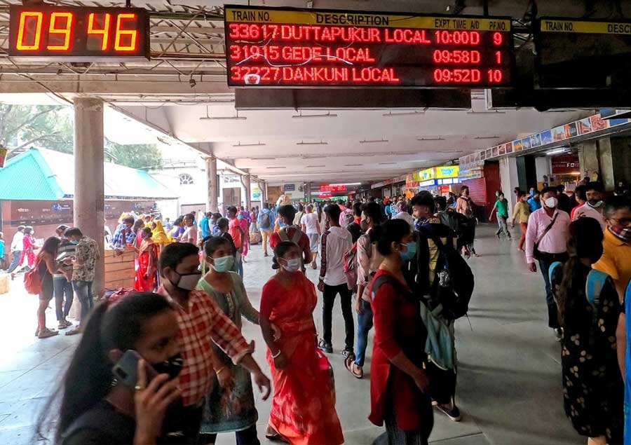 EASY COMMUTE: Commuters at Sealdah station on Monday, November 1. The resumption of local train services in the state has brought respite to many people who depend on it for their daily bread and butter