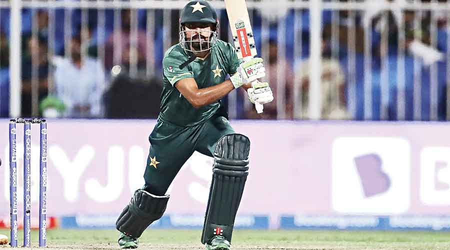 Pakistan captain Babar Azam plays a shot during their match against Scotland in Sharjah on Sunday.