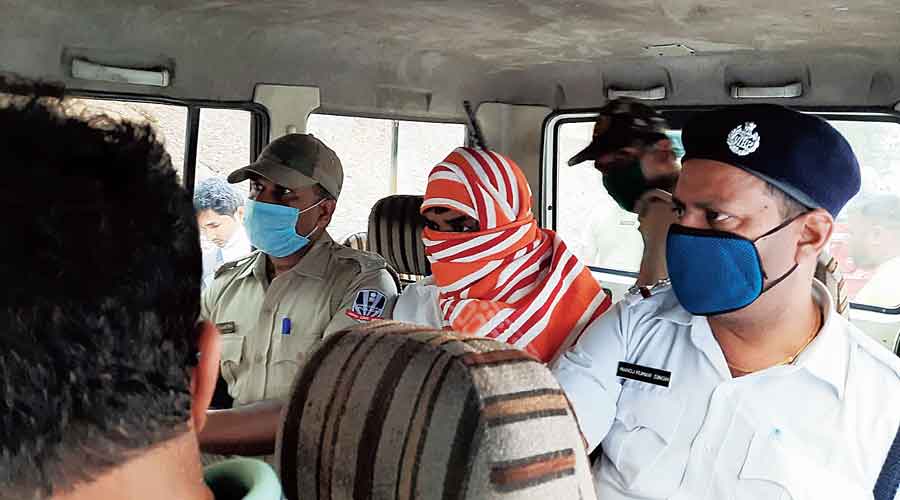 Alleged sand smuggling kingpin Parvej Alam Suddiqui being taken to court in Durgapur. 