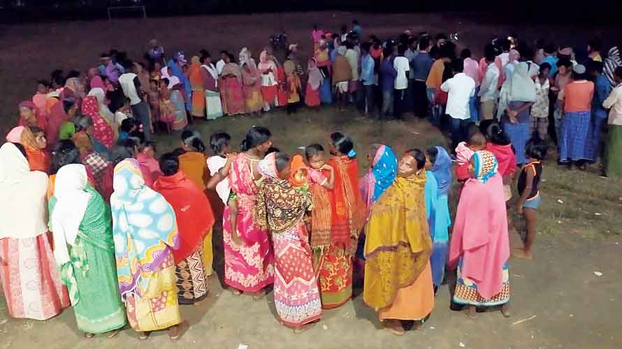 Tribal people in Birbhum’s Dewanganj discuss the proposed rehabilitation package on Wednesday.