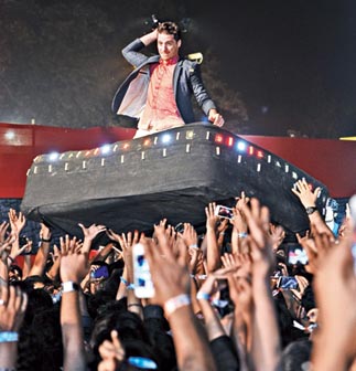 Mutemath frontman Paul Meany crowd-surfs on a mattress at Nicco Park during Bacardi NH7 Weekender in 2014