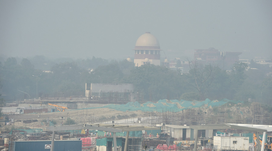 A view of the Supreme Court of India, shrouded in smog, in New Delhi on Saturday.