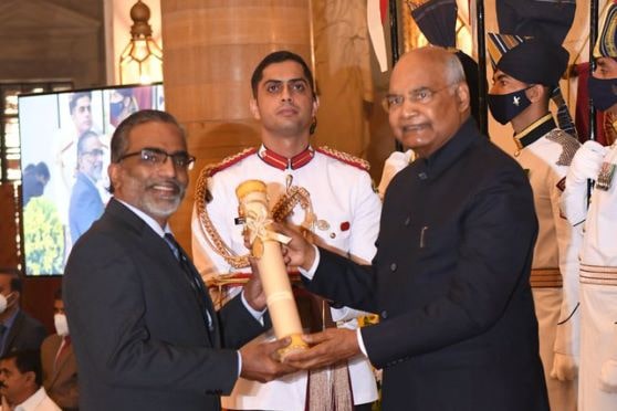 T. Pradeep receives the award from President Ram Nath Kovind.